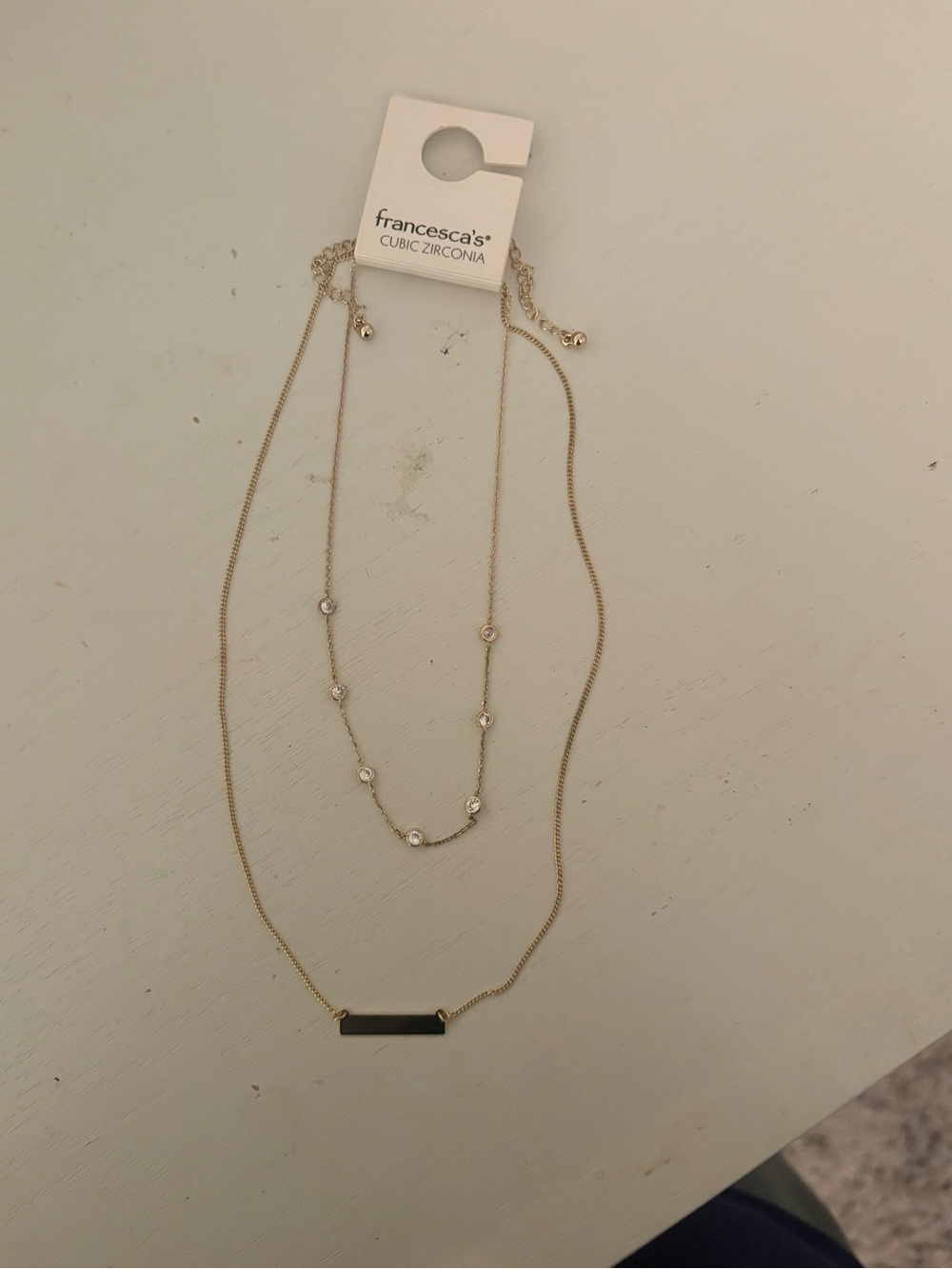Francesca's Collections Gold Layered Necklace with Black Bar and CZ Accents
